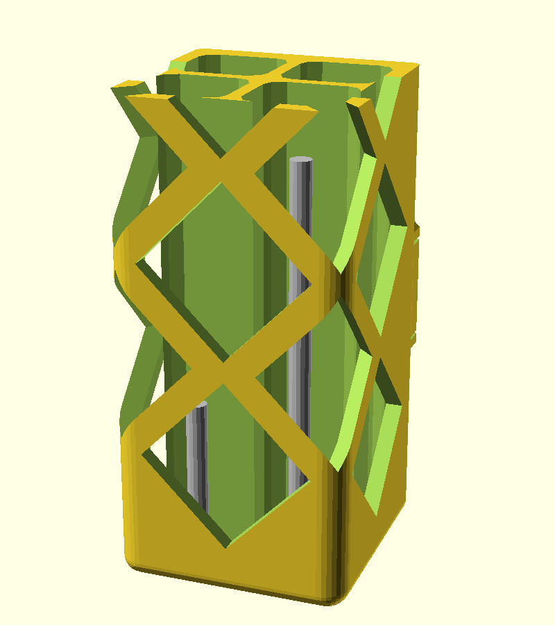 Bottom of the holder seen from a front corner, with short offcuts standing in two compartments behind the diamond windows