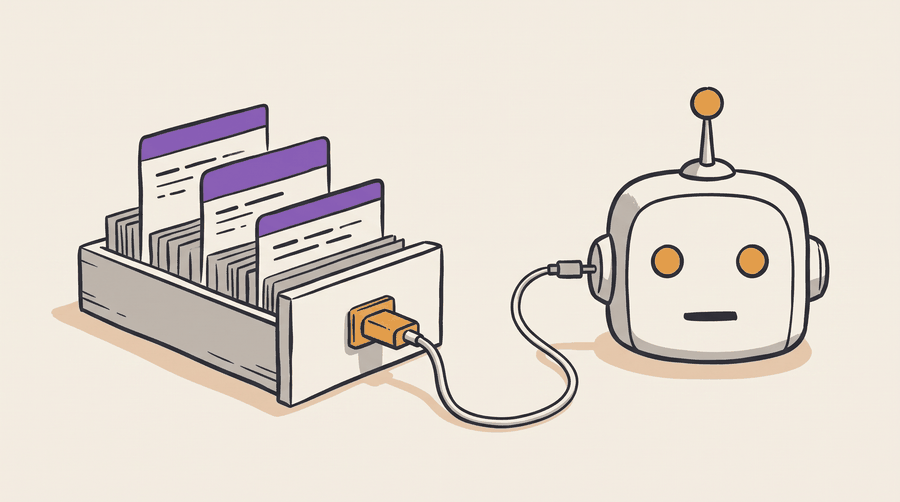 A friendly robot head facing forward, with a cable running from its ear socket to an open card-index drawer holding three highlighted cards